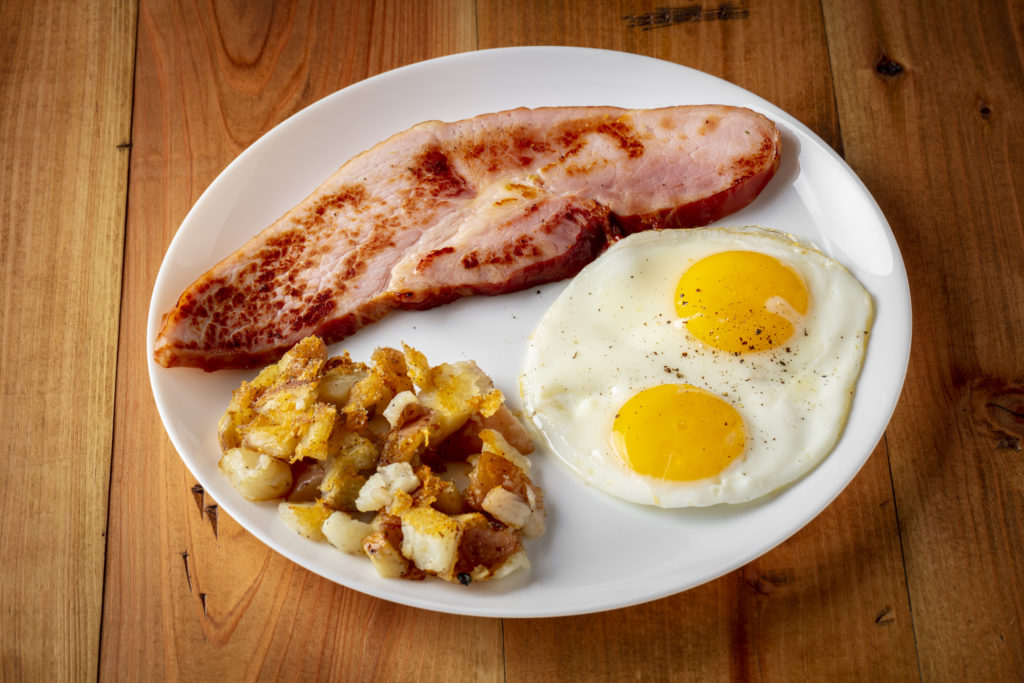 Thick-cut, ham and eggs breakfast.