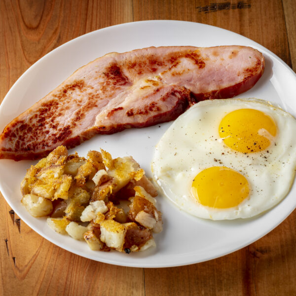 Thick-cut, ham and eggs breakfast.