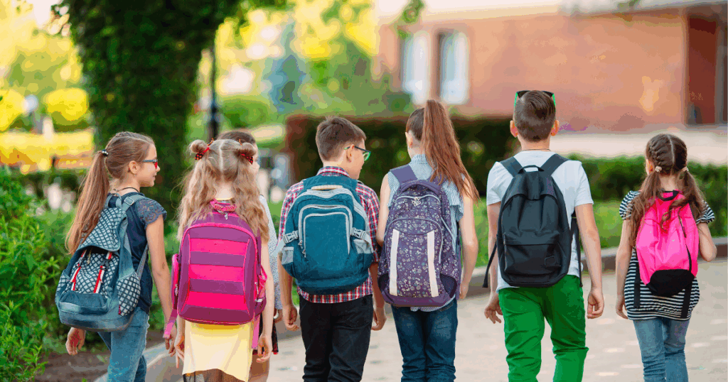 Kids walking together during the back-to-school season.